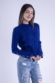 Suéter azul tejido con brillos en manga