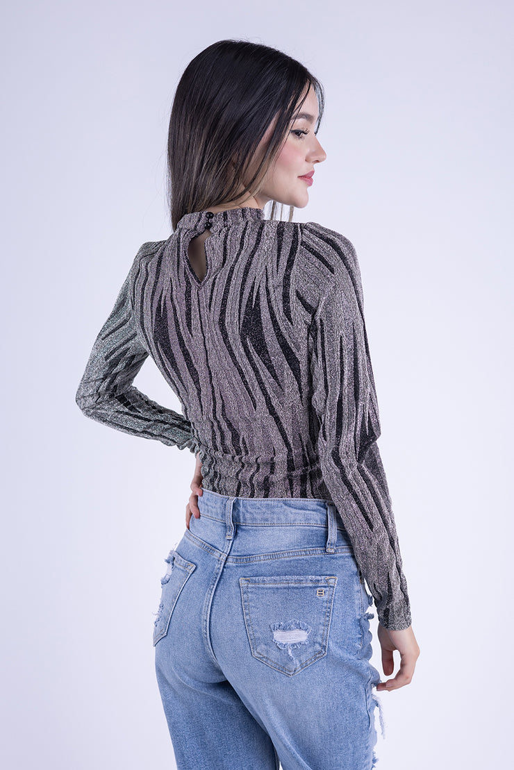 Blusa con destellos y rayas