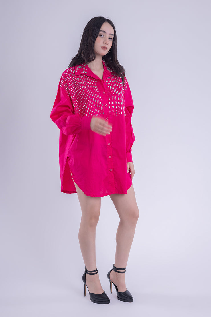 Blusa oversize tipo camisa con aplicaciones