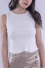 Top tipo tank top con aplicaciones de piedras