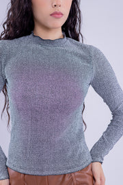 Blusa con destellos brillosos de manga larga