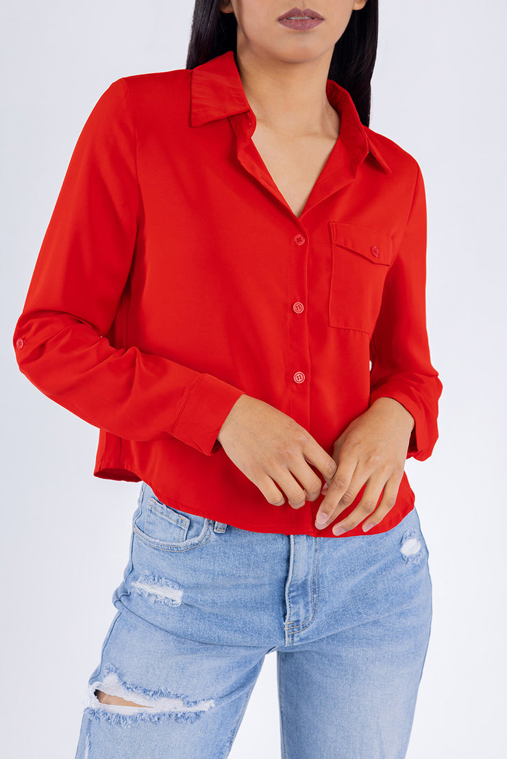 Blusa roja manga larga con botones ocultos
