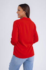 Blusa roja manga larga con botones ocultos