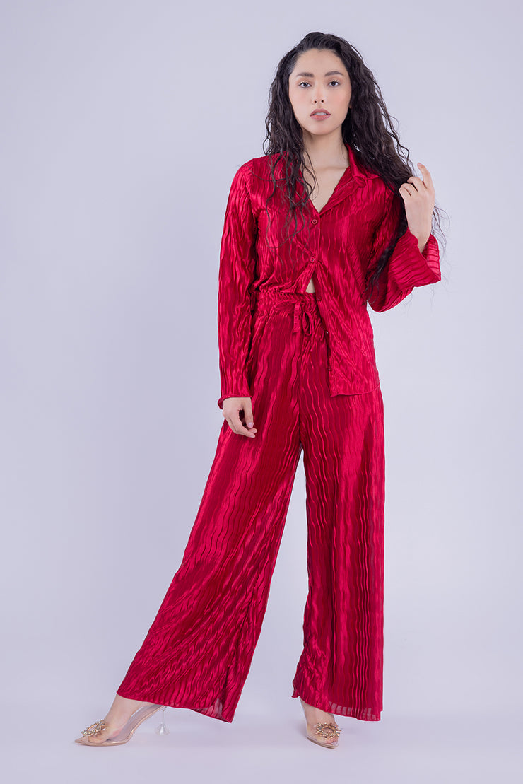 Conjunto satinado de blusa y pantalon