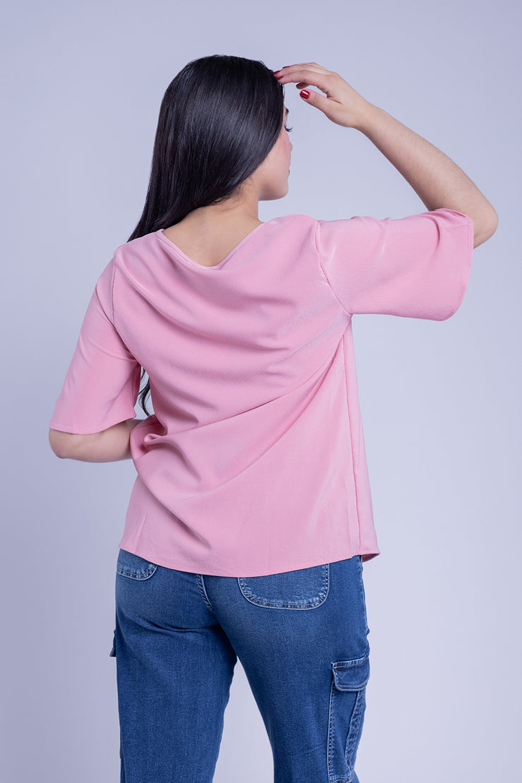 Blusa rosa oversize con detalle tejido