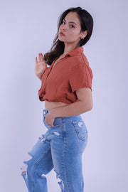 Top con amarre en cintura abotonado