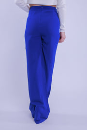 Pantalon tipo palazo con cadena en cintura