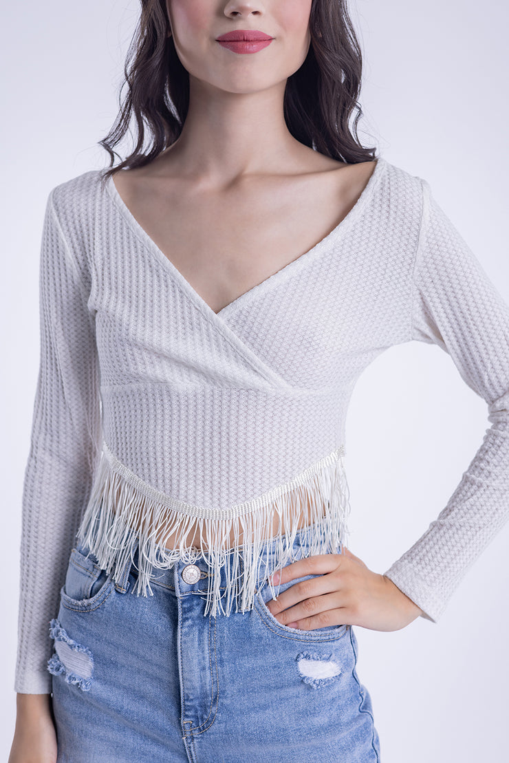 Blusa cruzada con detalla de flecos