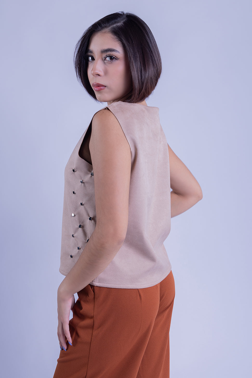 Blusa imitación piel con estoperoles