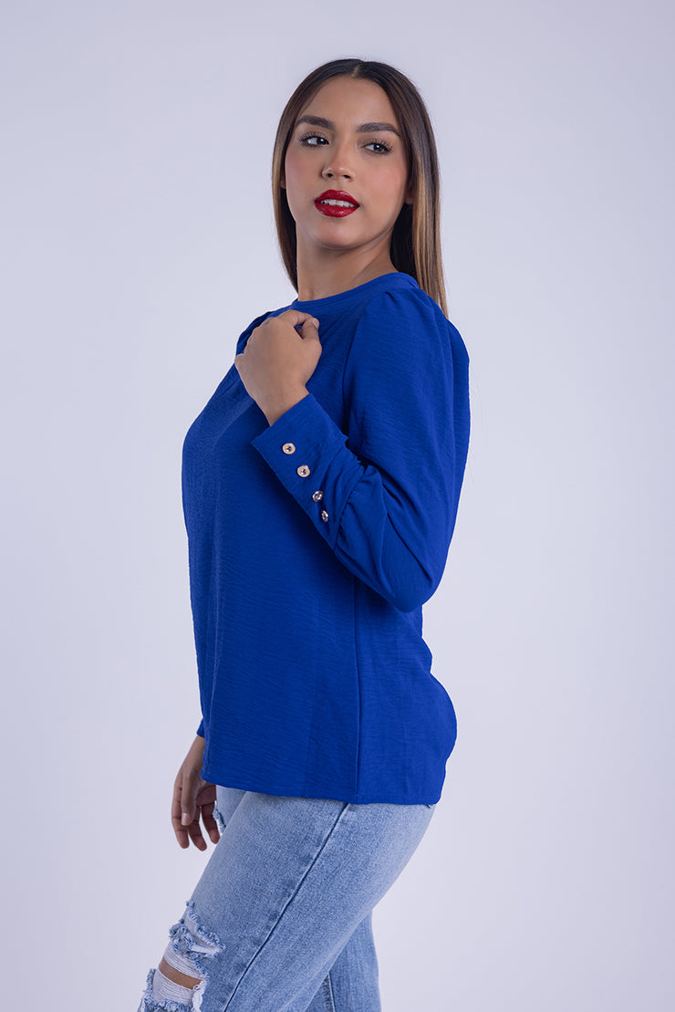 Blusa tipo sueter con aplicaciones en manga