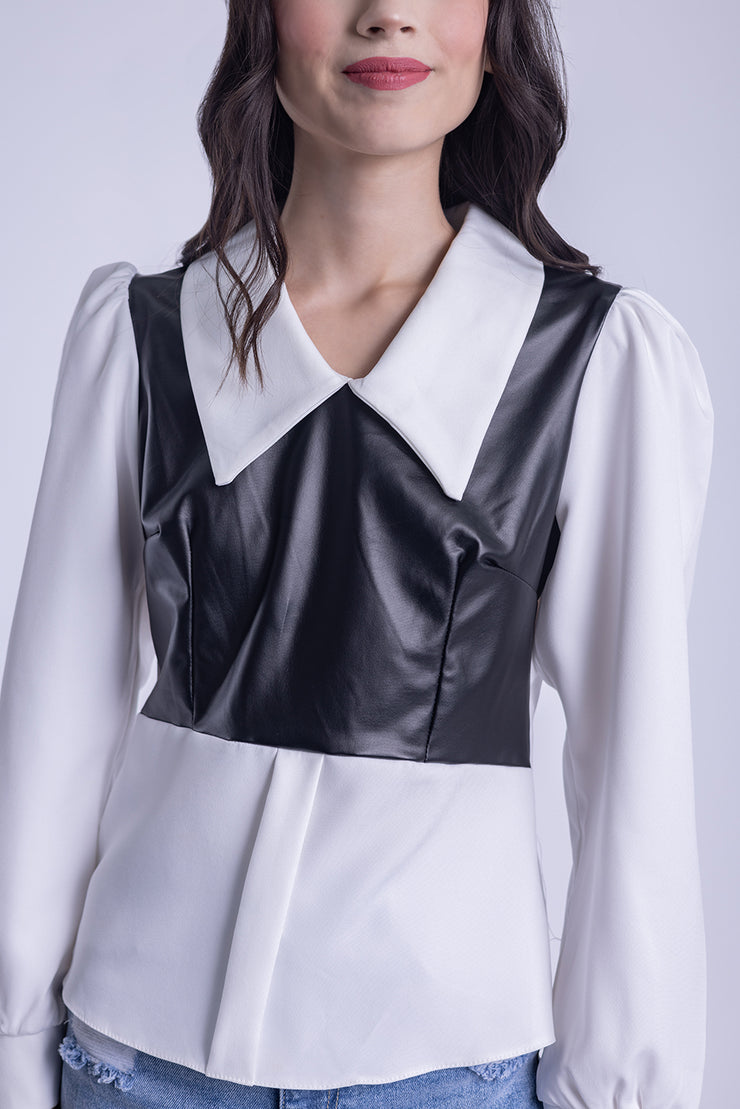 Blusa de vestir con chaleco de vinil