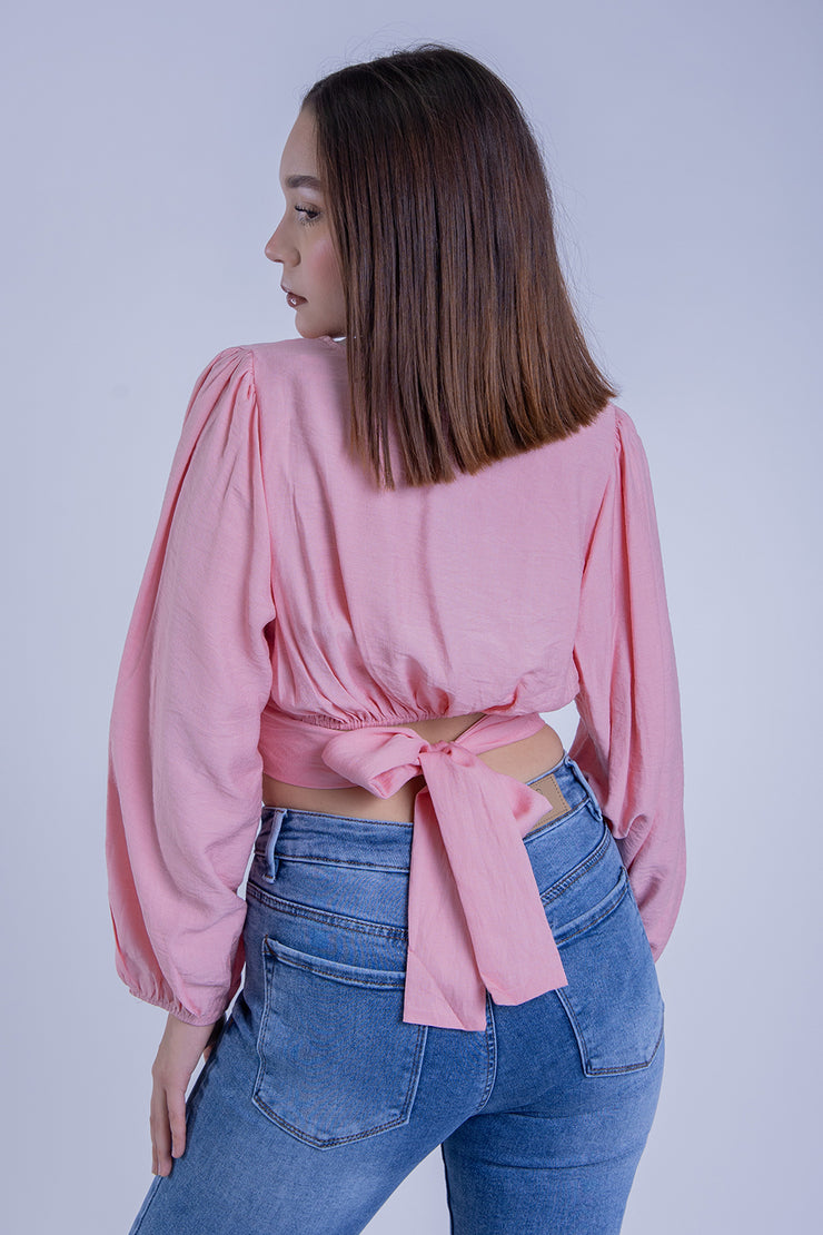 Crop top rosa con manga tipo globo