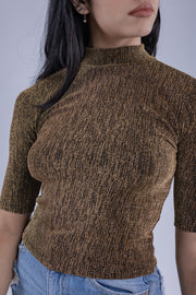 Crop top de destellos dorados