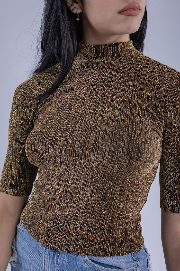 Crop top de destellos dorados