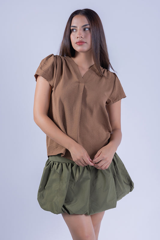Blusa beige con cuello en V