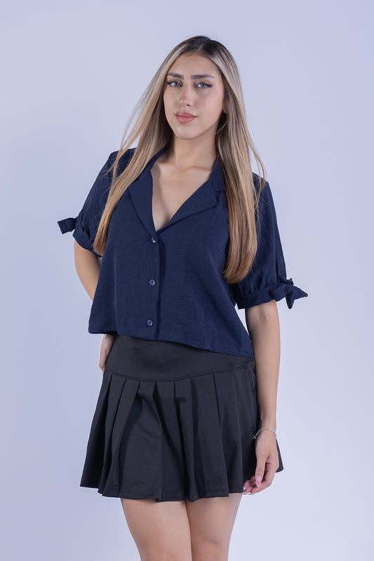 Blusa abotonada con manga plisada