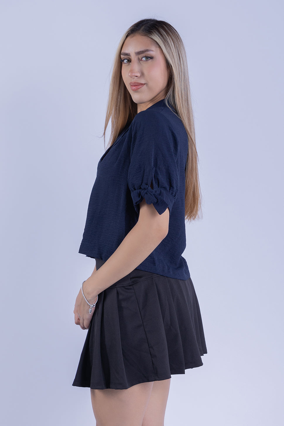 Blusa abotonada con manga plisada