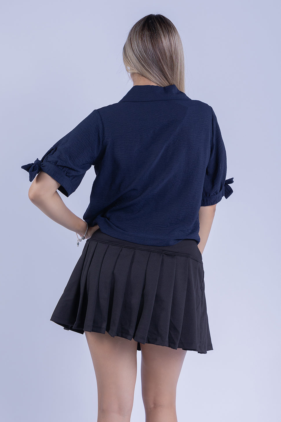 Blusa abotonada con manga plisada