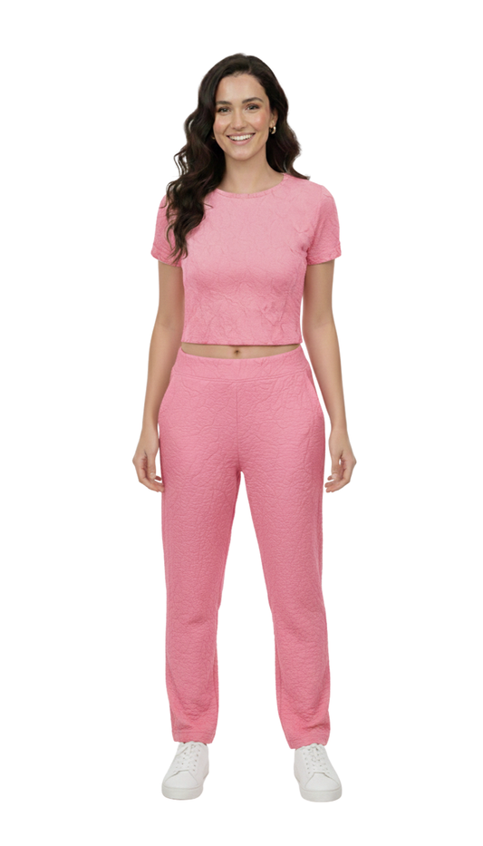 Conjunto rosa de blusa con amarre en espalda y pantalón