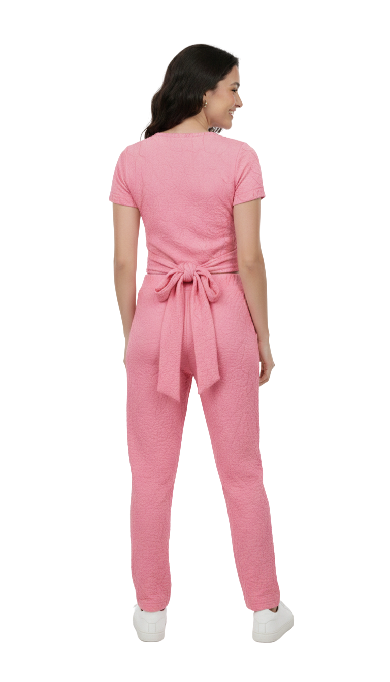 Conjunto rosa de blusa con amarre en espalda y pantalón