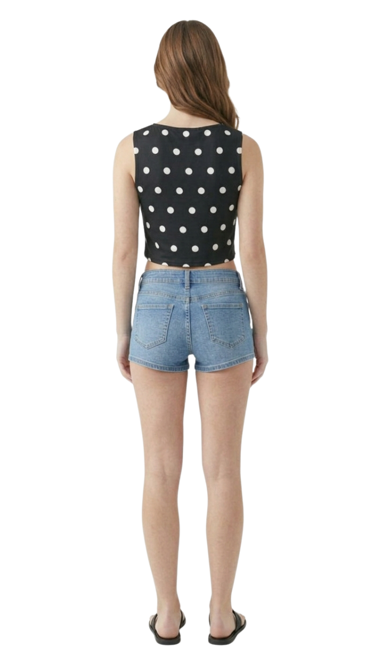 Blusa tipo top negra con bolas blancas