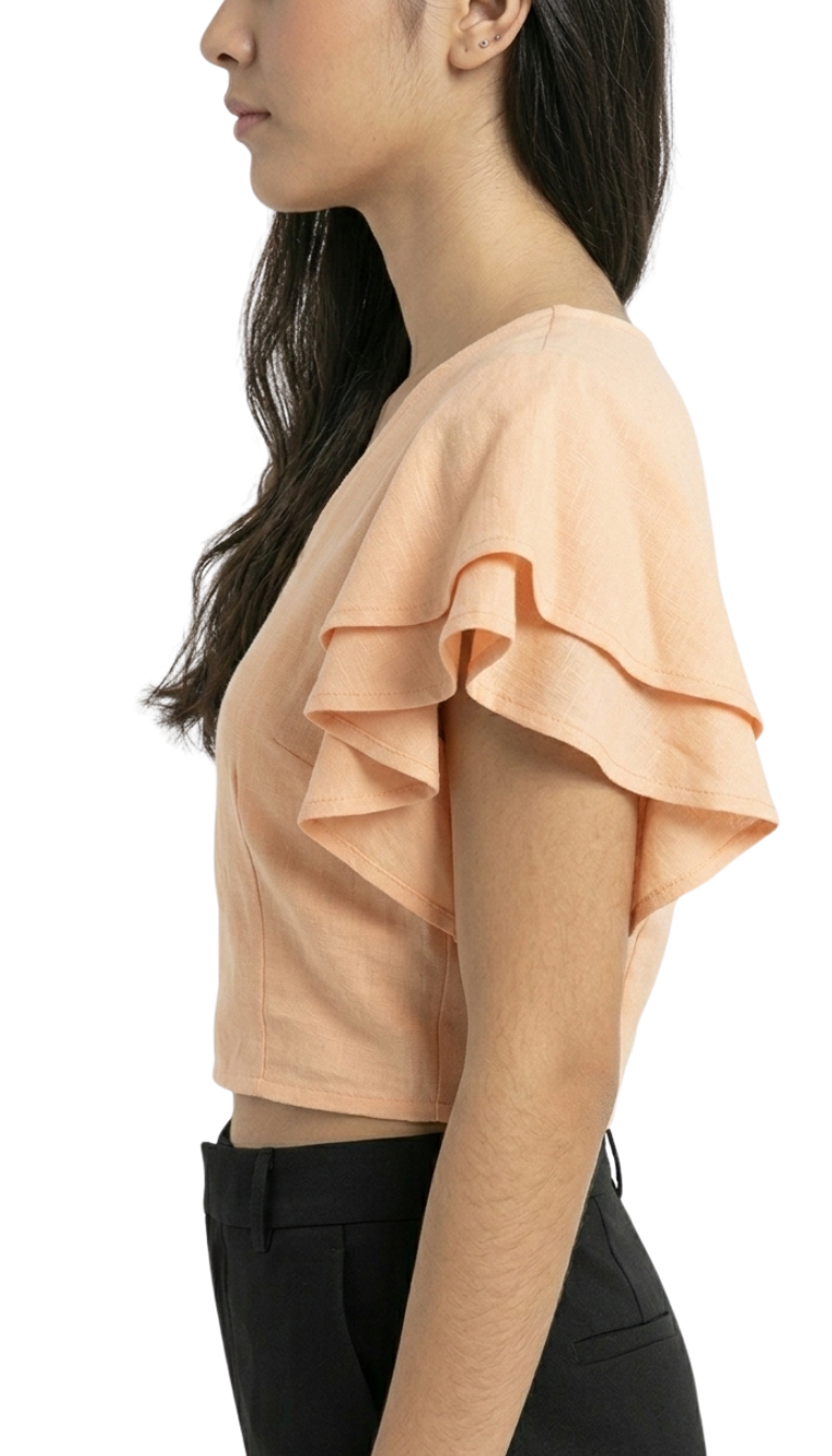 Blusa color salmon con olanes en mangas