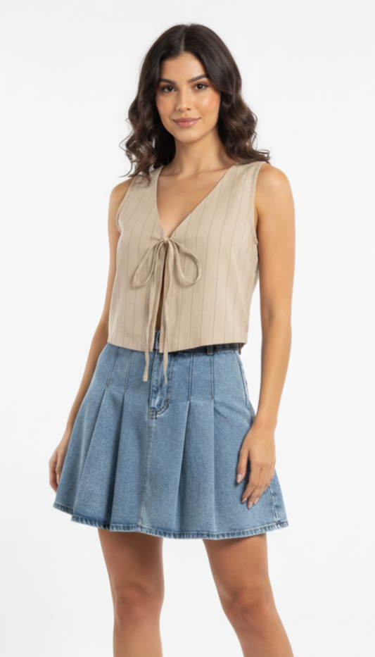 Blusa beige rayada con moños al frente