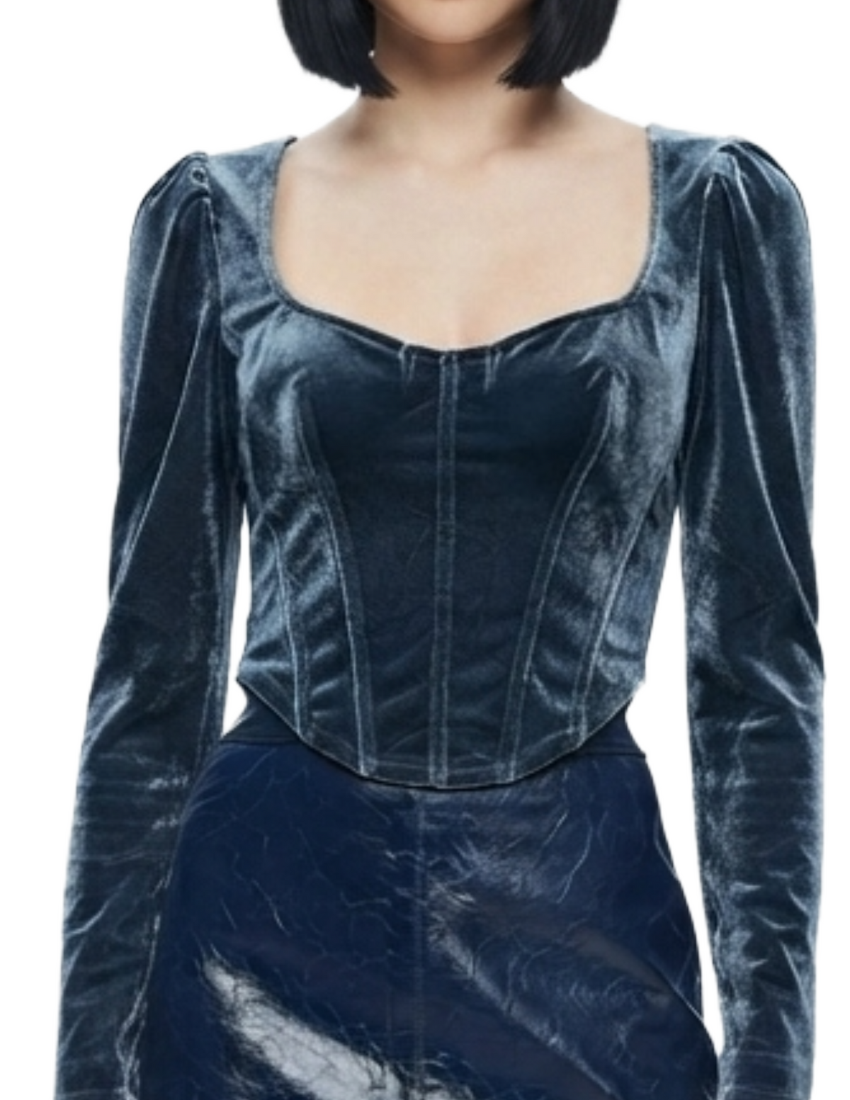 Blusa azul seccionada de gamuza