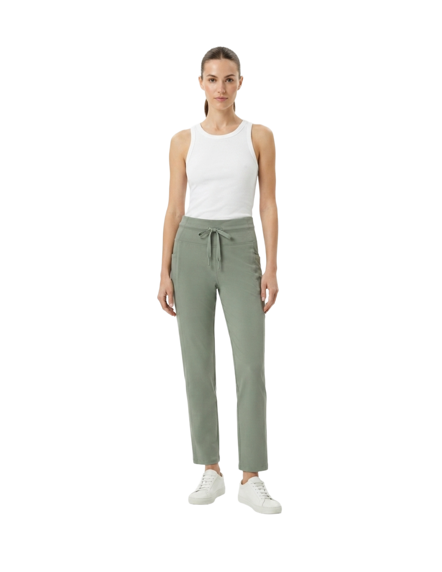 Legging verde con bolsas laterales y costuras decorativas