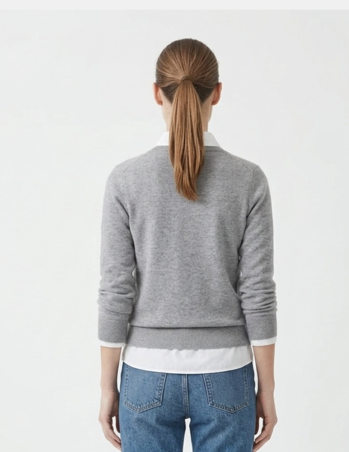 Blusa tipo suéter con cuello estilo camisa