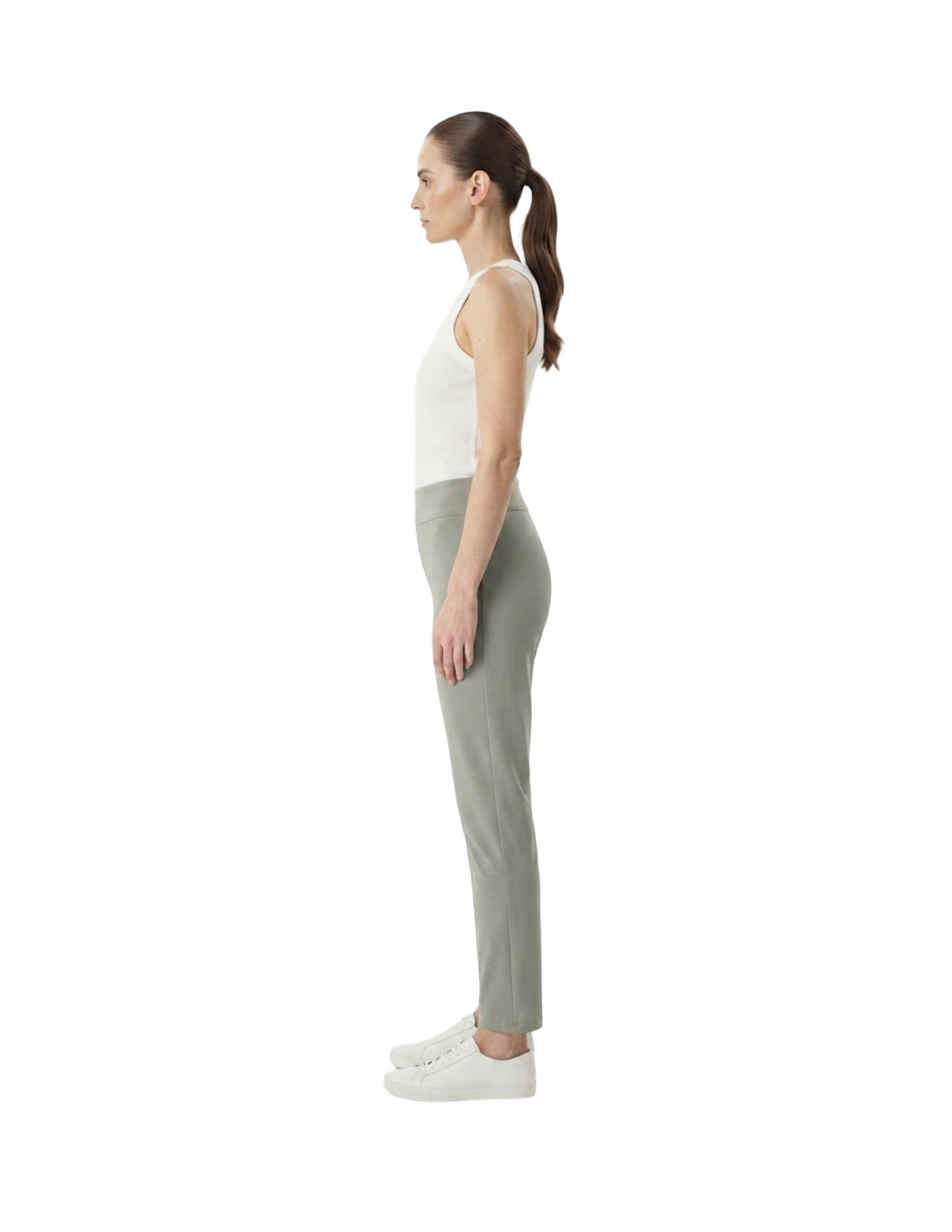 Legging verde con bolsas laterales y costuras decorativas