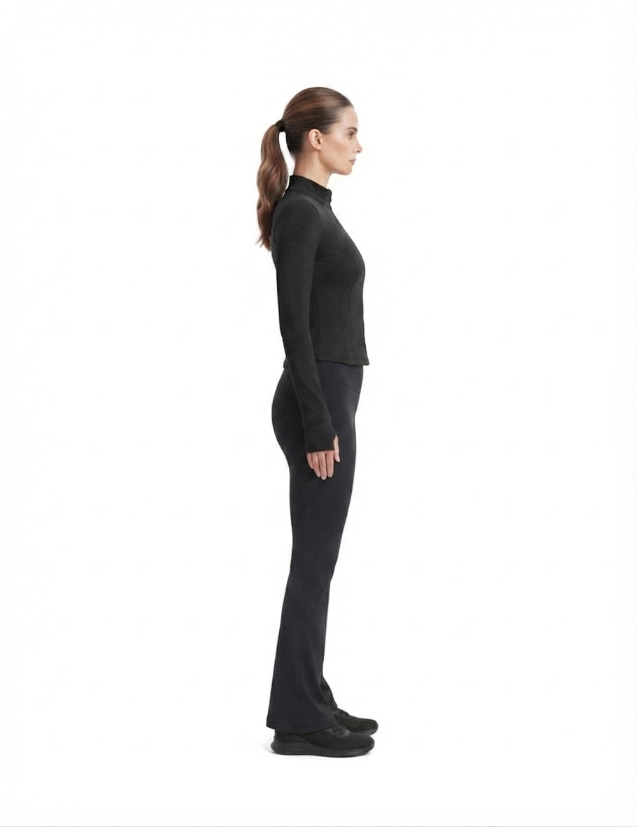 Conjunto deportivo negro de chamarra y pantalón