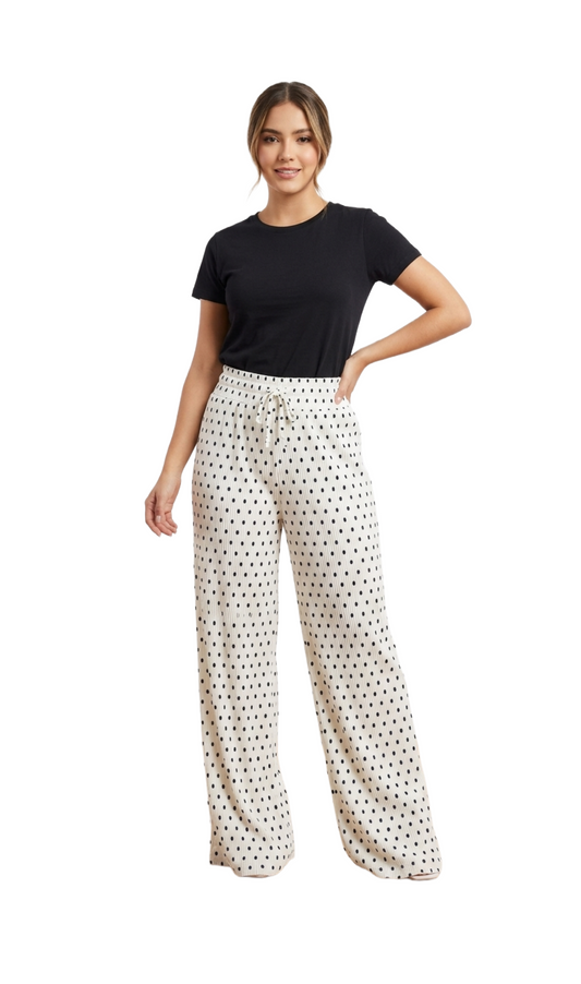 Pantalón blanco acanalado con puntos negros elástico en cintura