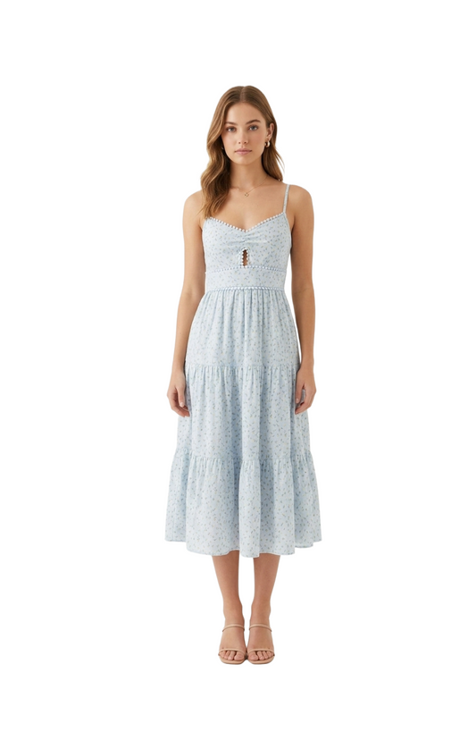 Vestido azul de tirantes con estampado floreado y escote discreto