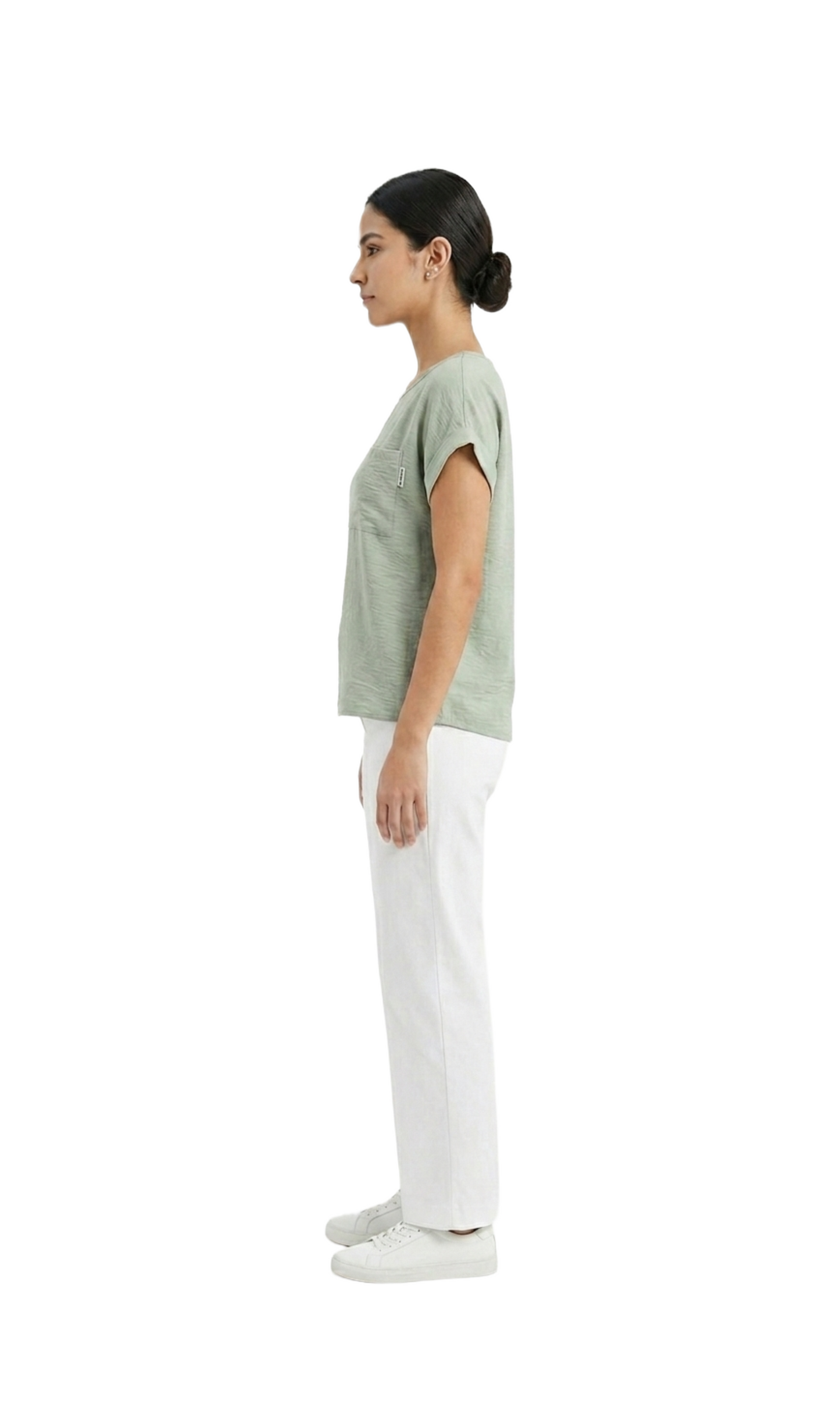 Blusa verde cuello redondo oversize con una bolsita