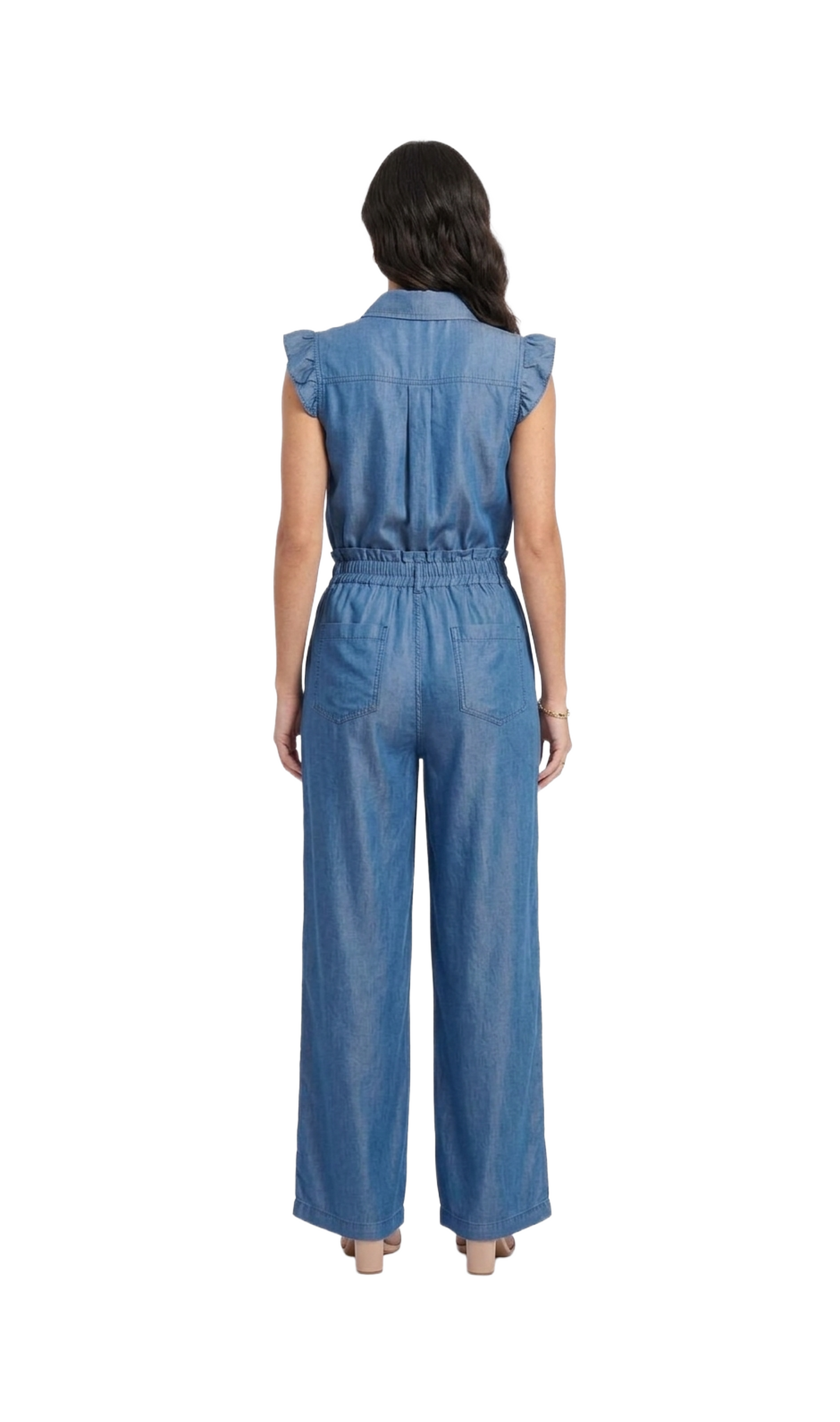 Conjunto azul de blusa con botones metalicos de figuras